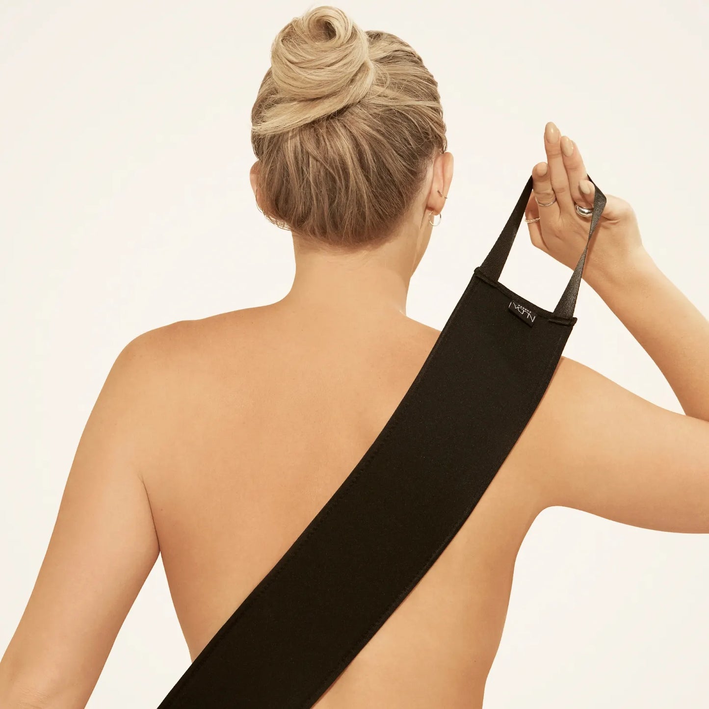 Applicateur d’autobronzant pour le dos